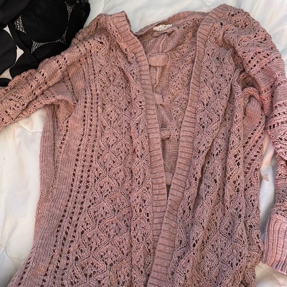 A pink cardigan size large